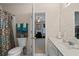 Bathroom with double vanity and access to bedroom at 2600 Wells Sw Ter, Atlanta, GA 30331
