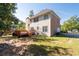 Two story house with large deck and grassy backyard at 2600 Wells Sw Ter, Atlanta, GA 30331
