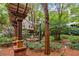 Landscaped courtyard with pergola and fountain at 1850 Cotillion Dr # 3215, Atlanta, GA 30338