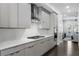 Modern kitchen with stainless steel appliances and gray cabinets at 3668 Allegretto Cir, Atlanta, GA 30339