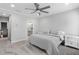 Main bedroom with ceiling fan and ensuite bathroom access at 3668 Allegretto Cir, Atlanta, GA 30339