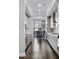 Long kitchen with stainless steel appliances and white cabinets at 3668 Allegretto Cir, Atlanta, GA 30339