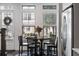 Round dining table with four chairs, view into kitchen at 3668 Allegretto Cir, Atlanta, GA 30339