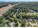 Aerial view of houses in a wooded neighborhood at 2558 Rainmaker Dr, Decatur, GA 30034