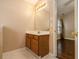 Bathroom with vanity, mirror, and access to bedroom at 2558 Rainmaker Dr, Decatur, GA 30034