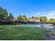 Inviting community pool with large grassy area at 2558 Rainmaker Dr, Decatur, GA 30034