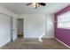 Well-lit bedroom with double closets and wall-to-wall carpet at 3689 Laurie Woods Ln, Decatur, GA 30034