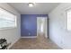 Small dining area with purple accent wall and tile floor at 3689 Laurie Woods Ln, Decatur, GA 30034
