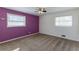 Spacious bedroom with two windows and neutral wall colors at 3689 Laurie Woods Ln, Decatur, GA 30034