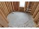 Unfinished round bathroom with plumbing and a window during the home's construction at 1197 Dee Kennedy Rd, Auburn, GA 30011