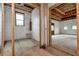 Unfinished basement with plumbing and framing nearly complete at 1197 Dee Kennedy Rd, Auburn, GA 30011