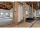 Open basement framing, showing potential for future rooms and finishes at 1197 Dee Kennedy Rd, Auburn, GA 30011