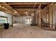 Unfinished basement with exposed framing and plumbing at 1197 Dee Kennedy Rd, Auburn, GA 30011