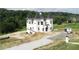 Luxury home with a unique architectural style and a large yard at 1197 Dee Kennedy Rd, Auburn, GA 30011