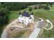 A luxurious under-construction home boasts a unique design and ample land at 1197 Dee Kennedy Rd, Auburn, GA 30011
