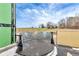 Unfinished rooftop deck overlooking a wooded area at 1197 Dee Kennedy Rd, Auburn, GA 30011