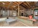 Spacious unfinished basement with high ceilings and large windows at 1197 Dee Kennedy Rd, Auburn, GA 30011
