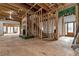 Living area with fireplace and staircase, still under construction at 1197 Dee Kennedy Rd, Auburn, GA 30011
