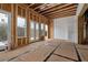 Main bedroom with sliding glass doors and windows, under construction at 1197 Dee Kennedy Rd, Auburn, GA 30011