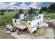 Luxury home under construction with unique architectural details and expansive grounds at 1197 Dee Kennedy Rd, Auburn, GA 30011