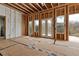 Main bedroom with access to the outdoors, currently in framing stage at 1197 Dee Kennedy Rd, Auburn, GA 30011