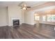 Spacious living room with fireplace and hardwood floors at 10074 Tara Glynn Dr, Hampton, GA 30228