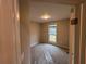 Bedroom with carpet, neutral paint, and a window at 5544 Whispering Swan Ct, Douglasville, GA 30135
