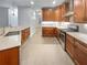 Updated kitchen with stainless steel appliances and granite counters at 1512 Maplewood Ct, Woodstock, GA 30189