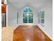 Breakfast room with hardwood floors and large window at 1512 Maplewood Ct, Woodstock, GA 30189