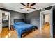 Bedroom with walk-in closet and ceiling fan at 5696 Kingsport Dr # 3, Atlanta, GA 30342