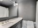 Modern bathroom with gray walls and quartz countertop at 5696 Kingsport Dr # 3, Atlanta, GA 30342