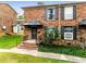 Brick front exterior of home with steps and landscaping at 5696 Kingsport Dr # 3, Atlanta, GA 30342