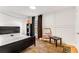Bedroom with a large window and animal print rug at 5696 Kingsport Dr # 3, Atlanta, GA 30342