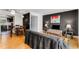 Open living area with hardwood floors, a comfortable couch, and a view of the kitchen at 5696 Kingsport Dr # 3, Atlanta, GA 30342