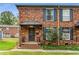 Brick front exterior of home with steps and landscaping at 5696 Kingsport Dr # 3, Atlanta, GA 30342