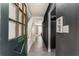 Hallway with green door, tile floor and staircase at 5696 Kingsport Dr # 3, Atlanta, GA 30342