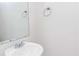 Small bathroom with white sink and vanity at 10922 Wheeler Trce, Hampton, GA 30228