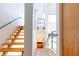 Bright, modern staircase with light wood steps and metal railings at 1136 Ponce De Leon Ne Ave # 3, Atlanta, GA 30306