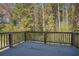 Wooden deck overlooking a wooded area at 26 Broadstone Blvd, Acworth, GA 30101