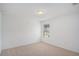 Bright bedroom with window and neutral carpet at 26 Broadstone Blvd, Acworth, GA 30101