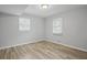 Simple bedroom with gray walls and wood-look flooring at 2539 Appomattox Dr, Decatur, GA 30034