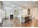 Open living room with hardwood floors, fireplace, and built-in shelving at 550 Constellation Overlook Sw, Atlanta, GA 30331