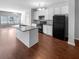 Modern kitchen featuring granite countertops and a kitchen island at 1861 Old Dogwood, Jonesboro, GA 30238
