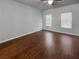 Spacious bedroom with hardwood floors and ceiling fan at 1861 Old Dogwood, Jonesboro, GA 30238