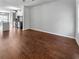 Open living room with hardwood floors and access to kitchen at 1861 Old Dogwood, Jonesboro, GA 30238