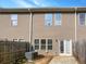 Private backyard with patio and wooden fence at 1861 Old Dogwood, Jonesboro, GA 30238