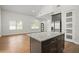 Modern kitchen with island and stainless steel appliances at 2373 Bouldercliff Se Way, Atlanta, GA 30316