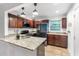 Modern kitchen with granite countertops and stainless steel appliances at 2240 Cheshire Bridge Rd # 205, Atlanta, GA 30324