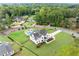 Stunning aerial view of a home with a large backyard and pool at 4391 Blackland Ne Dr, Marietta, GA 30067