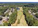 Aerial view of neighborhood with golf course at 1372 Downington Nw Ln, Acworth, GA 30101